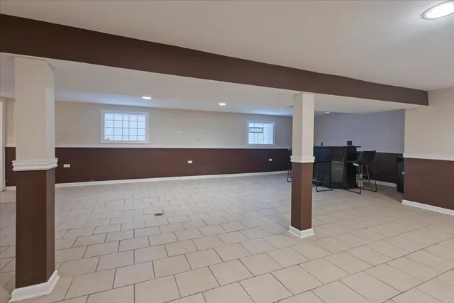 a view of kitchen and empty room