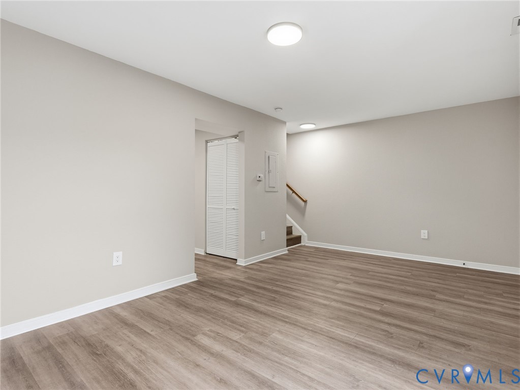 3518 East Richmond Road, Unit U3 Richmond, VA 23223 - Photo 5 of 19 a view of an empty room with wooden floor