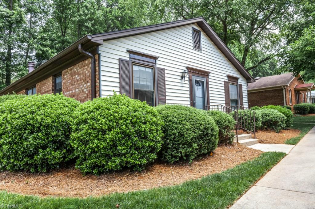 4924 Tower Road, Unit D Greensboro, NC 27410 - Photo 1 of 19 end unit all on one level with only 3 steps!