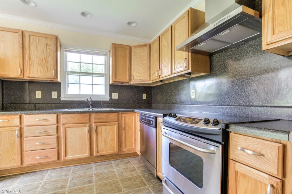 4924 Tower Road, Unit D Greensboro, NC 27410 - Photo 2 of 19 beautifully updated kitchen with Stainless appliances