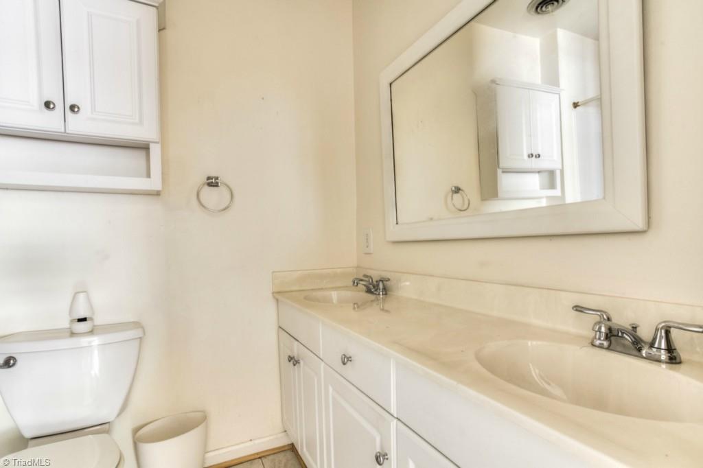 4924 Tower Road, Unit D Greensboro, NC 27410 - Photo 12 of 19 updated master bath with 2 sinks