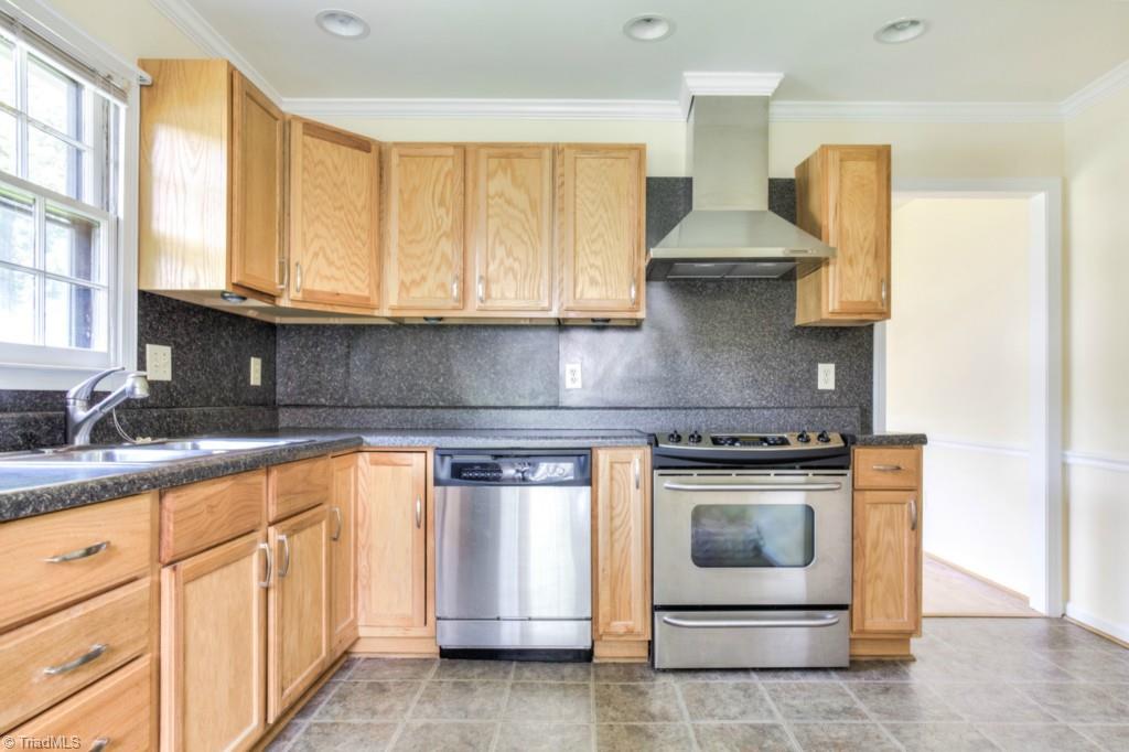 4924 Tower Road, Unit D Greensboro, NC 27410 - Photo 4 of 19 Wow, what a great range hood/exhaust vent