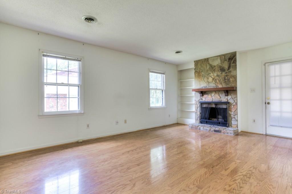 4924 Tower Road, Unit D Greensboro, NC 27410 - Photo 8 of 19 hardwoods throughout, except kitchen and master bath