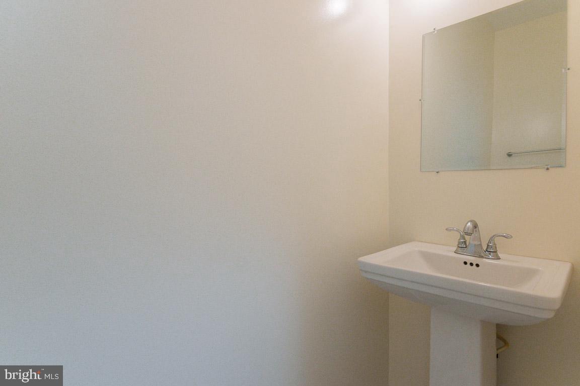 4518 Wakefield Road Baltimore, MD 21216 - Photo 13 of 20 LOWER LEVEL HALF BATH