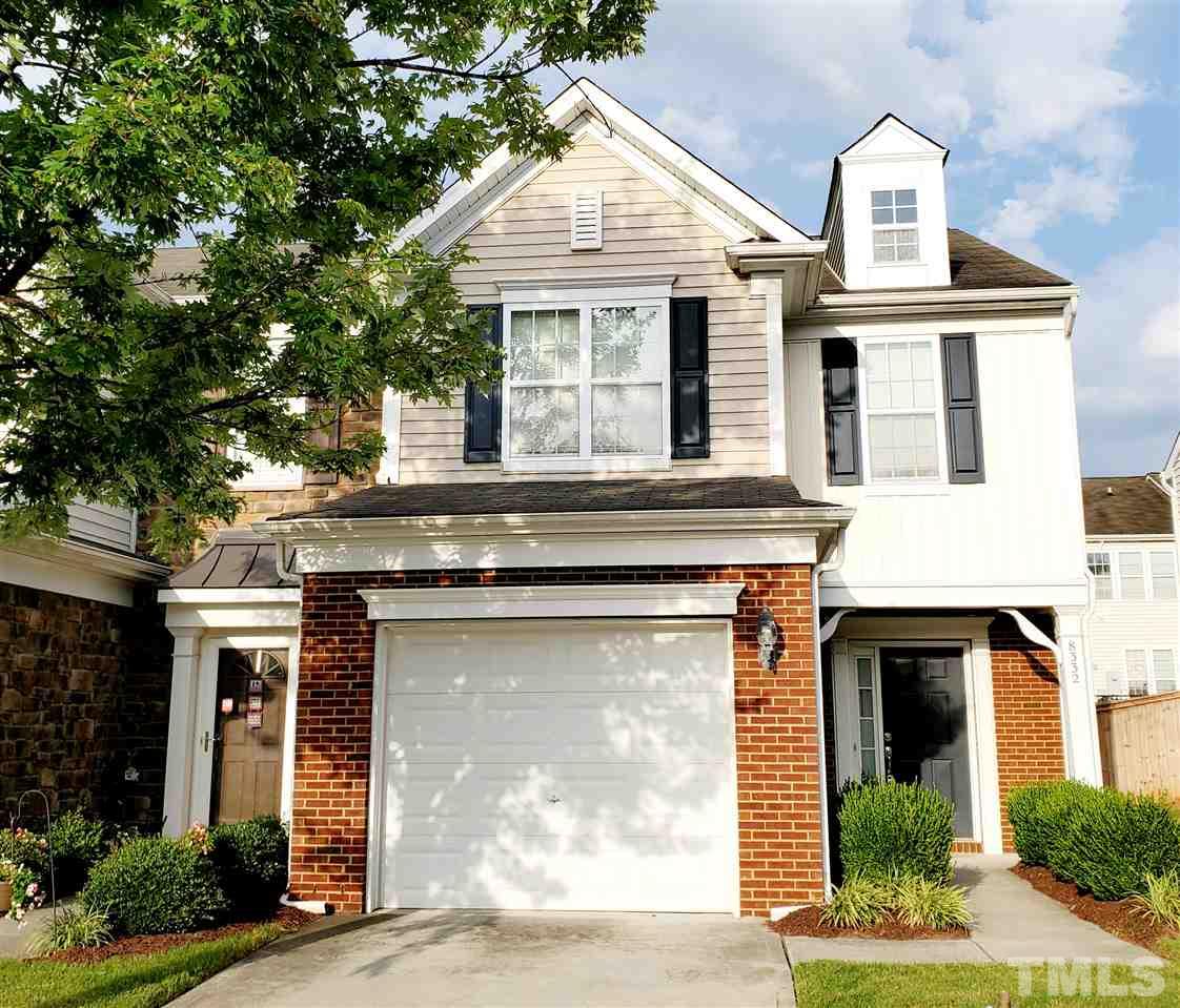 8332 Saltwood Place Raleigh, NC 27617 - Photo 1 of 16 a front view of a house with garage