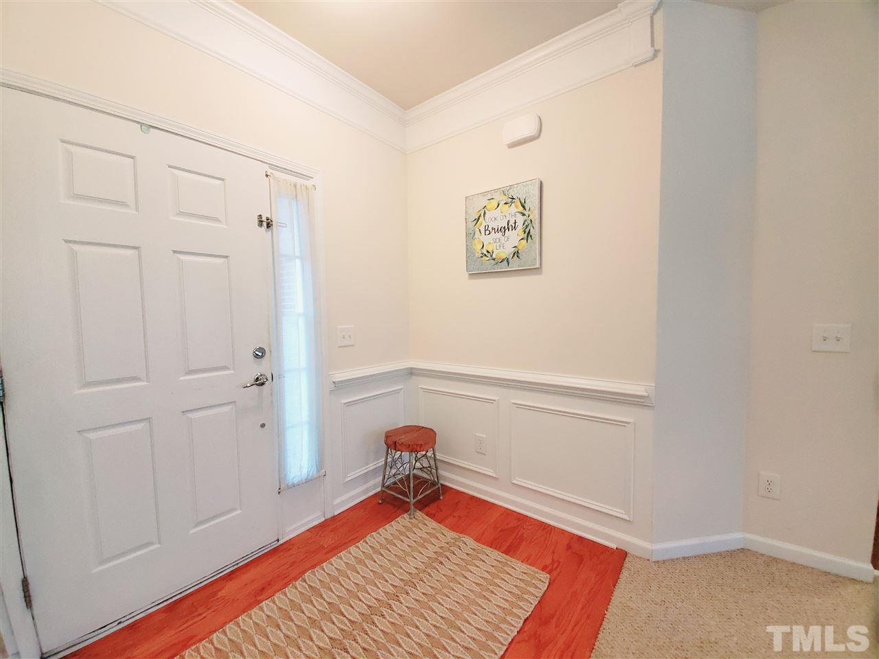 8332 Saltwood Place Raleigh, NC 27617 - Photo 13 of 16 a room with a bed and a window