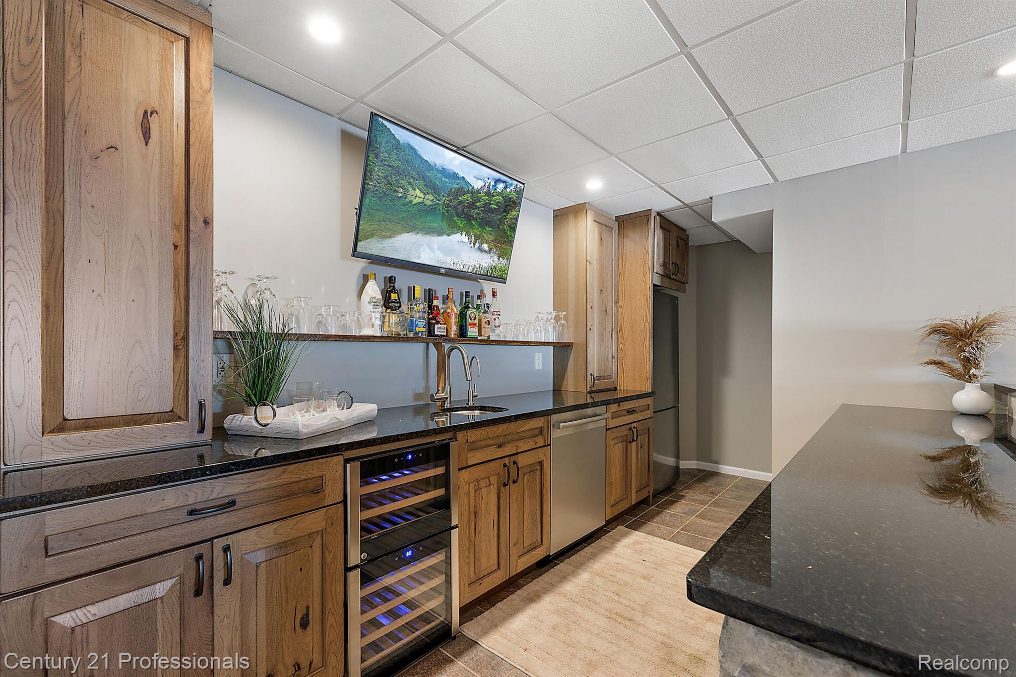 8856 Bridge Lake Road Clarkston, MI 48348 - Photo 56 of 91 ehind the bar w/ wine fridge and other appliances