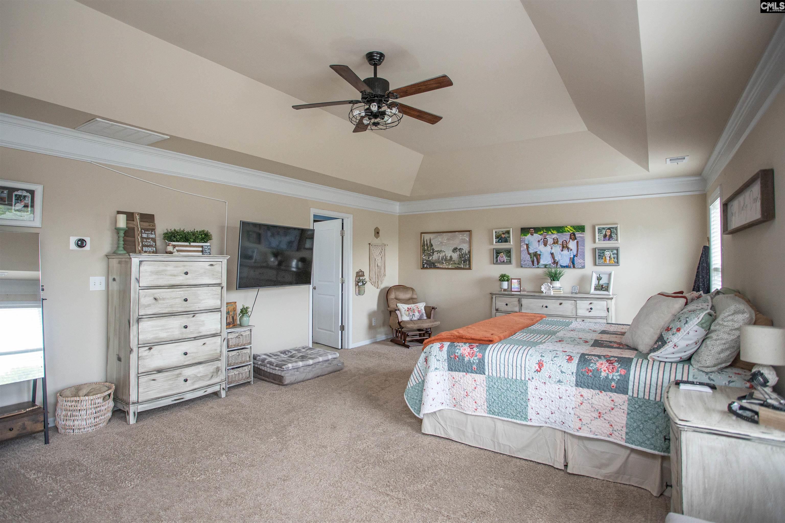 7 Templand Court Elgin, SC 29045 - Photo 30 of 47 a bedroom with furniture and a window