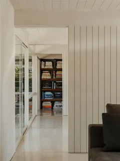 a view of balcony with furniture