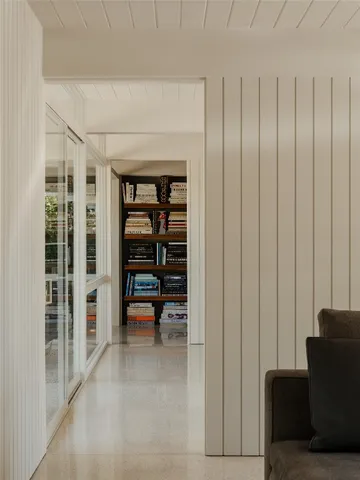 a view of balcony with furniture