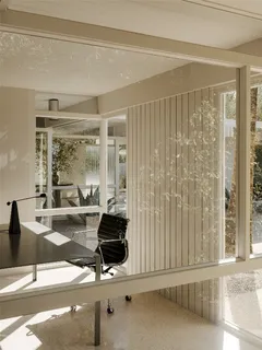 a view of a room with a table and chair