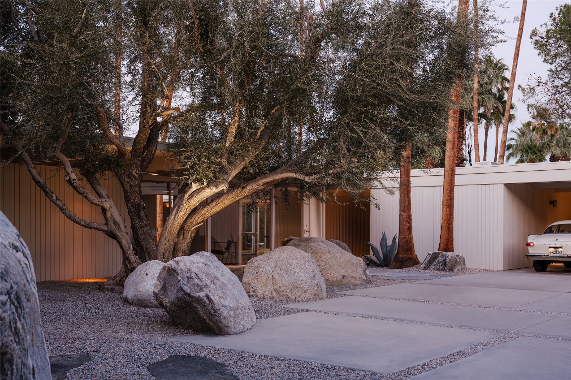 1272 East Verbena Drive Palm Springs, CA 92262 - Photo 2 of 40 a view of a car parked in front of a house