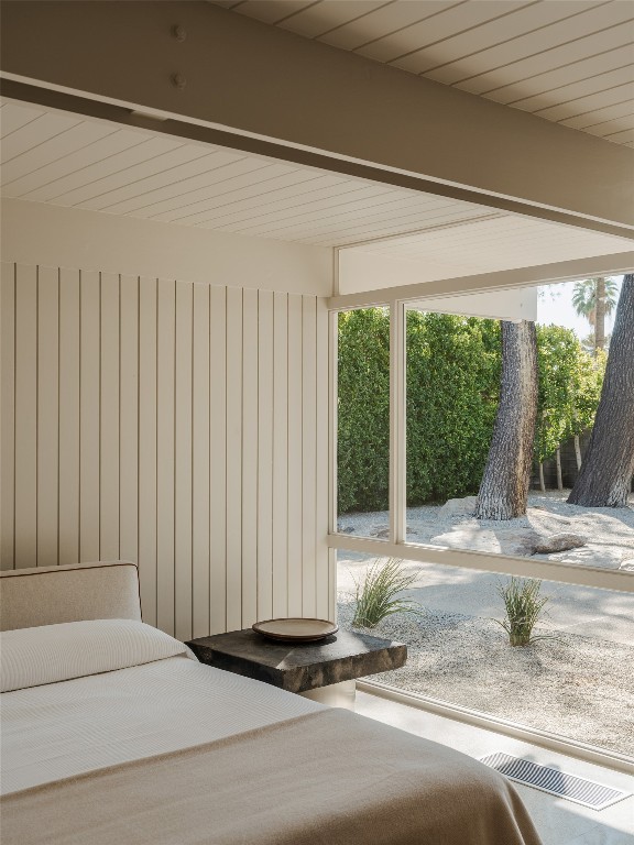 1272 East Verbena Drive Palm Springs, CA 92262 - Photo 34 of 40 a bedroom with a bed and a window