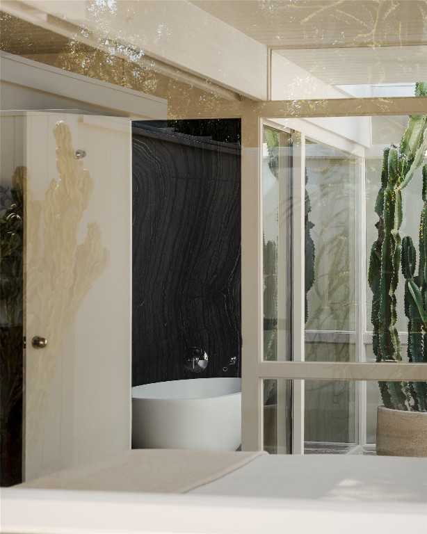 1272 East Verbena Drive Palm Springs, CA 92262 - Photo 37 of 40 a bathroom with a bathtub and a shower