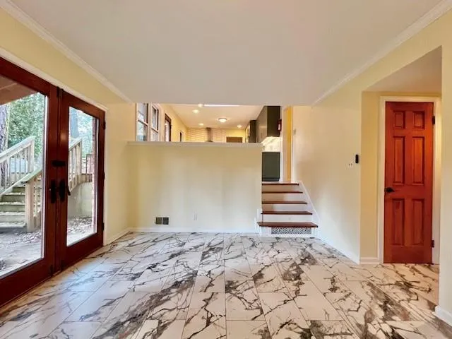 a view of a livingroom with a staircase