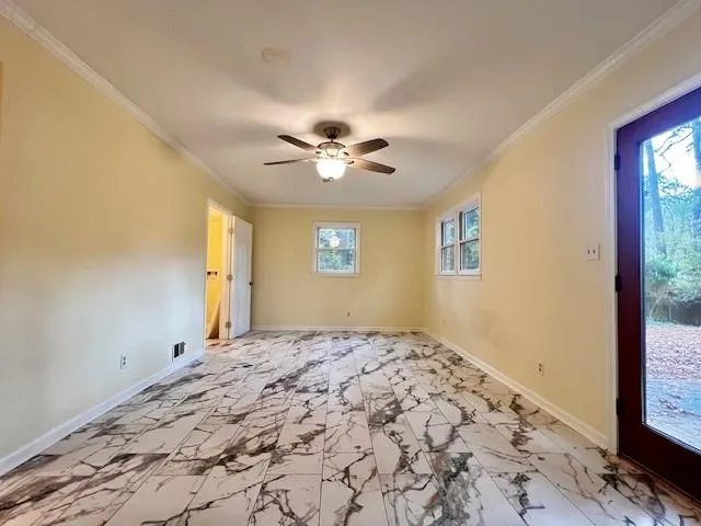 a view of a bedroom with a natural light