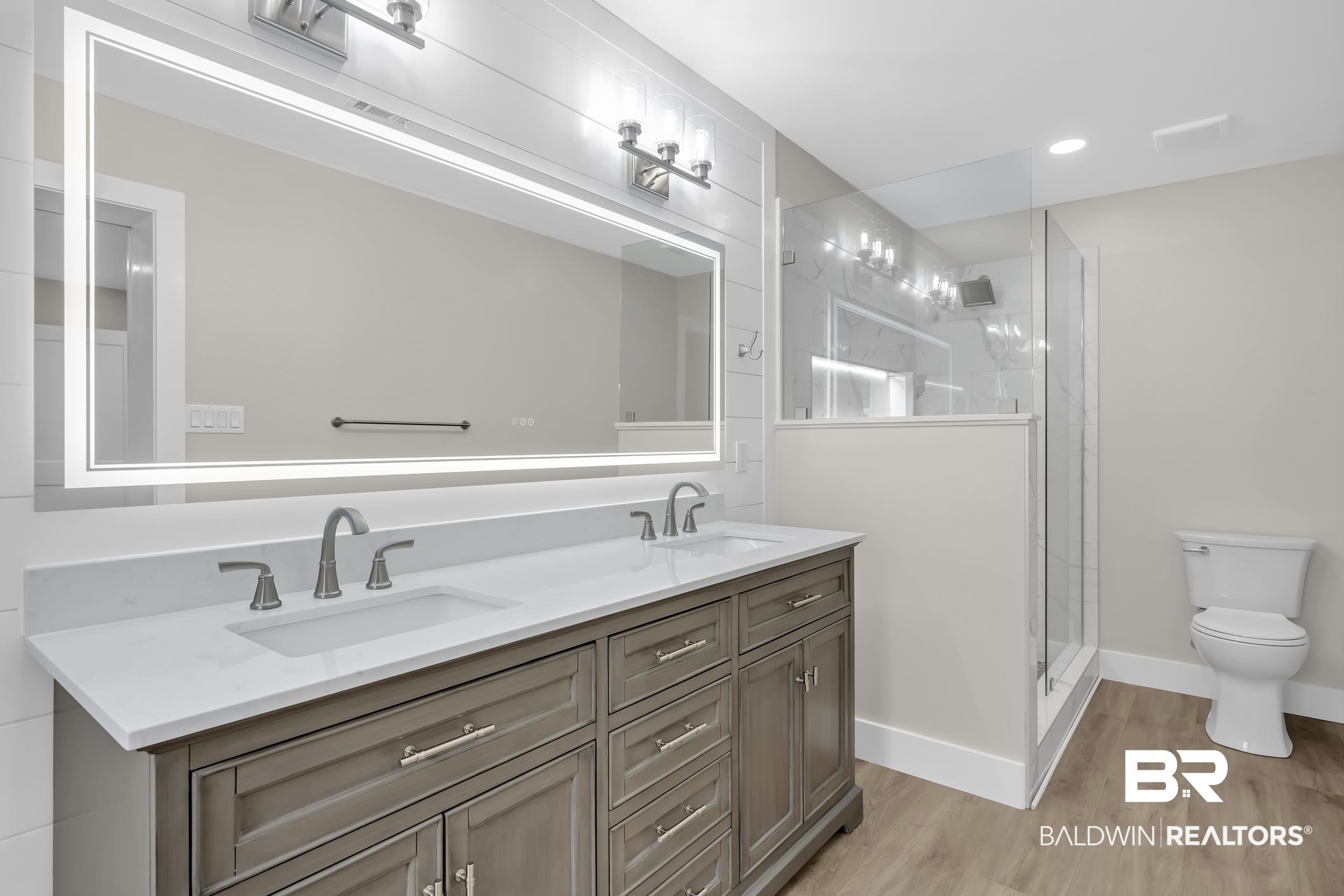 11381 Normandy Drive East Semmes, AL 36575 - Photo 11 of 23 Bathroom featuring double vanity, a shower stall, light wood finished floors, and recessed lighting