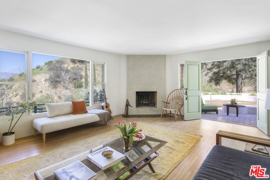 9609 Wornom Avenue Sunland, CA 91040 - Photo 11 of 52 a living room with furniture and a fireplace