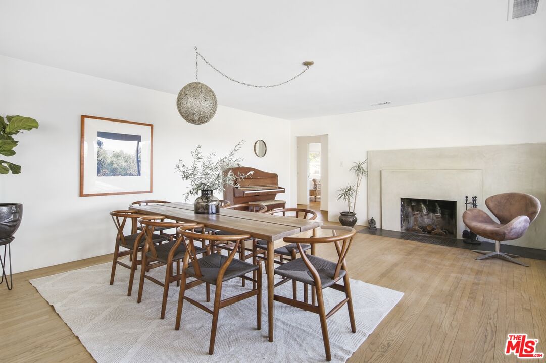 9609 Wornom Avenue Sunland, CA 91040 - Photo 19 of 52 a view of a dining room with furniture and chandelier