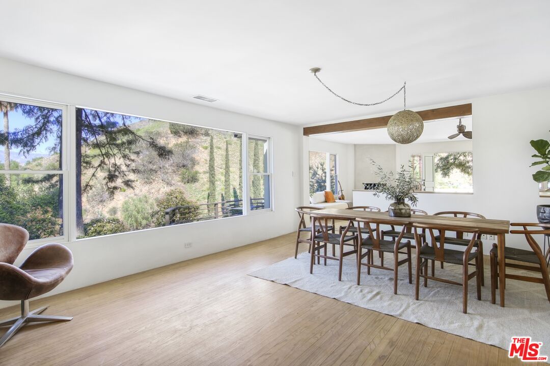 9609 Wornom Avenue Sunland, CA 91040 - Photo 21 of 52 a view of a dining room with furniture window and outside view