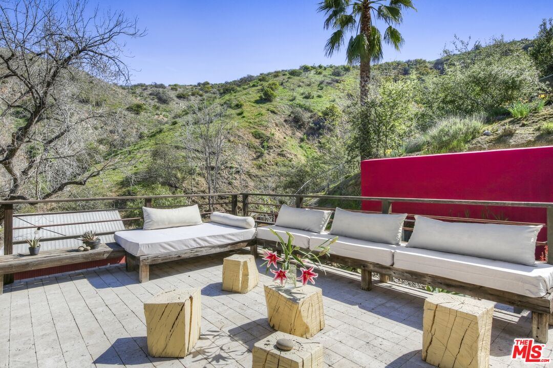 9609 Wornom Avenue Sunland, CA 91040 - Photo 31 of 52 a view of a terrace with couches and wooden floor