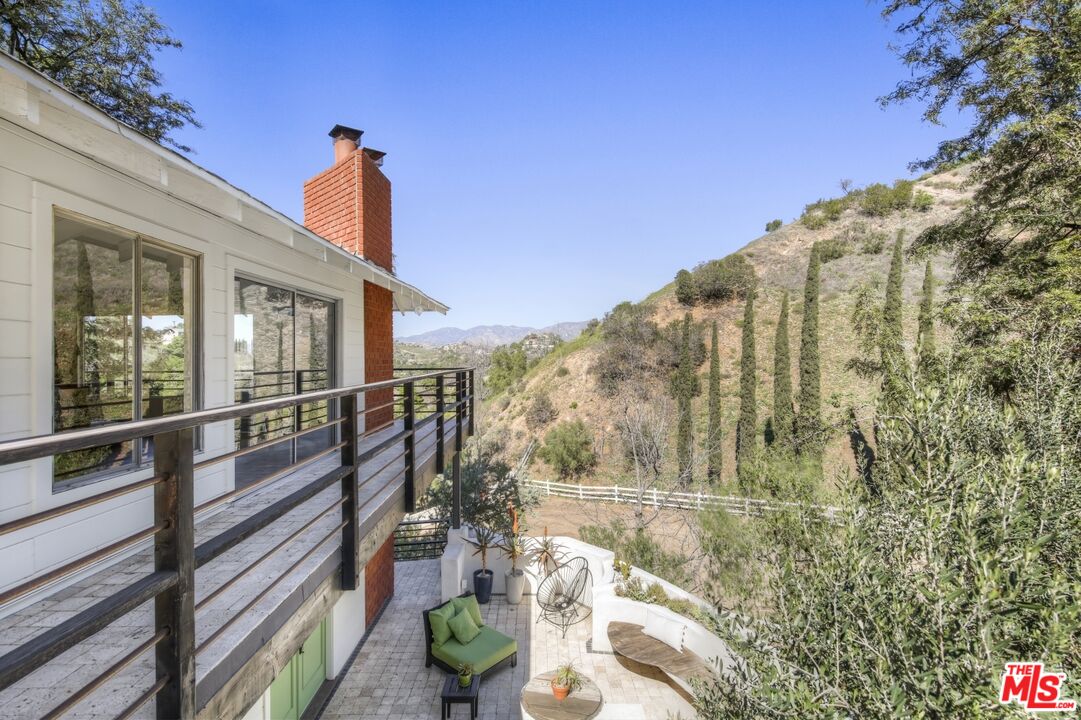 9609 Wornom Avenue Sunland, CA 91040 - Photo 32 of 52 a view of a balcony with wooden floor and fence