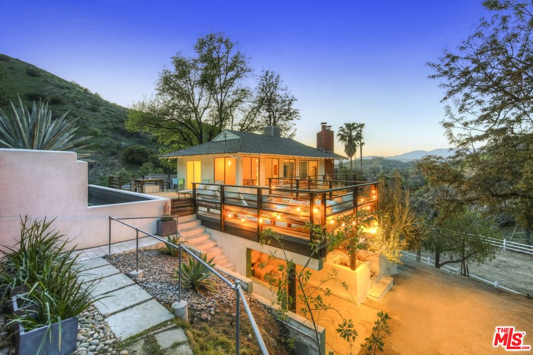 9609 Wornom Avenue Sunland, CA 91040 - Photo 44 of 52 a view of a swimming pool with a patio and a yard