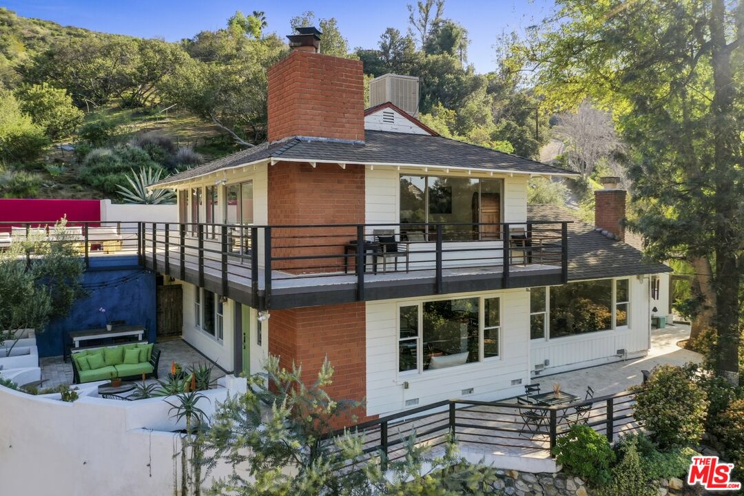 9609 Wornom Avenue Sunland, CA 91040 - Photo 5 of 52 a front view of a house with a yard