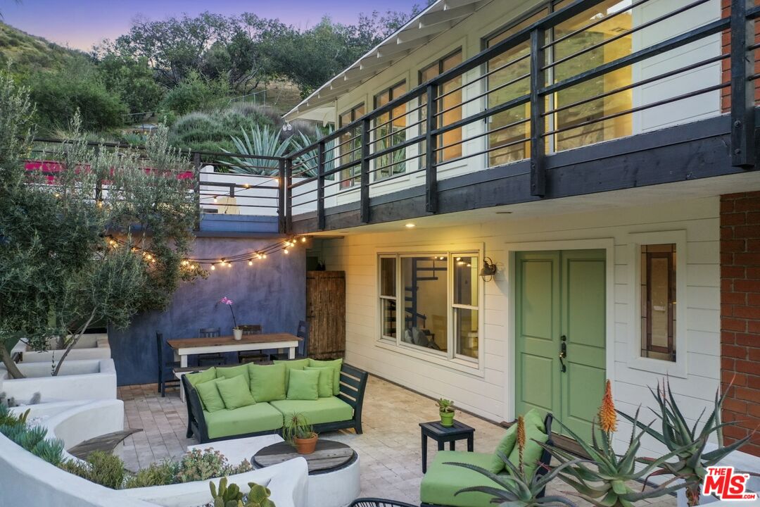 9609 Wornom Avenue Sunland, CA 91040 - Photo 8 of 52 a front view of a house with a garden