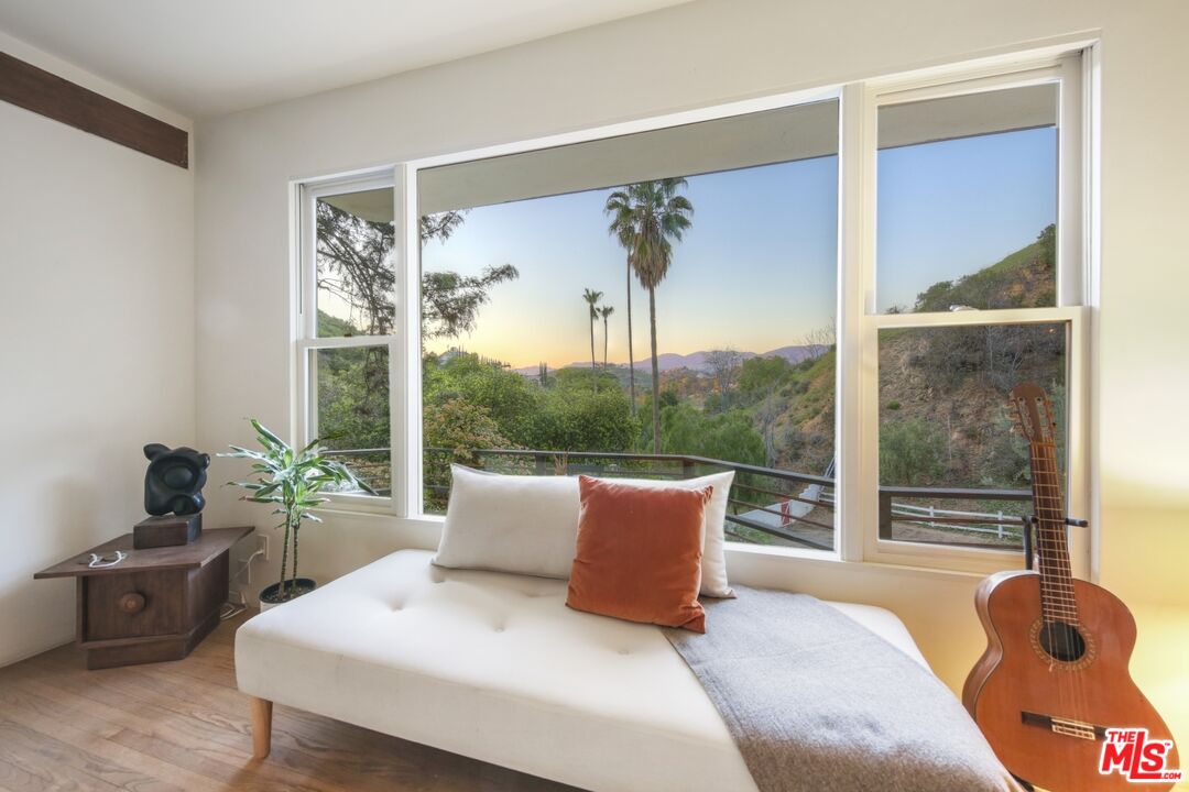 9609 Wornom Avenue Sunland, CA 91040 - Photo 10 of 52 a living room with furniture lamp and a large window