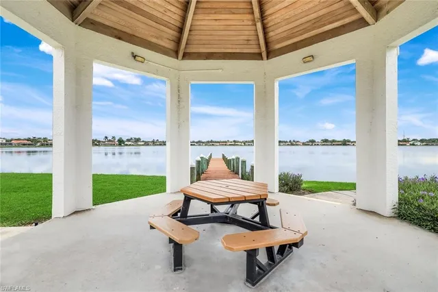 a view of a swimming pool with a patio