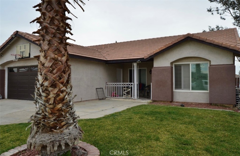 a house view with a garden space