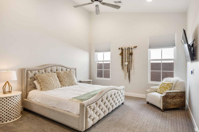 4222 Hampshire Road Hurricane, UT 84737 - Photo 6 of 12 Vaulted ceilings enhance this carpeted room featuring recessed lighting and a ceiling fan