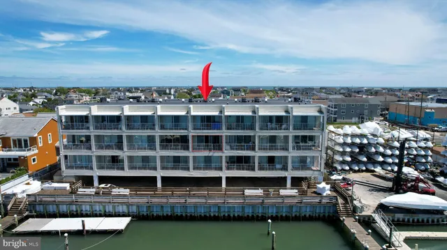 a kitchen with a lot of cabinets and a window