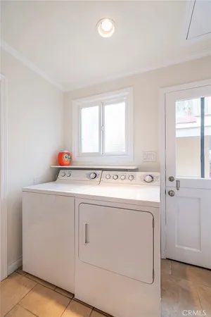 a utility room with washer and dryer