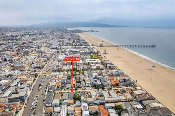 an aerial view of residential building and parking space
