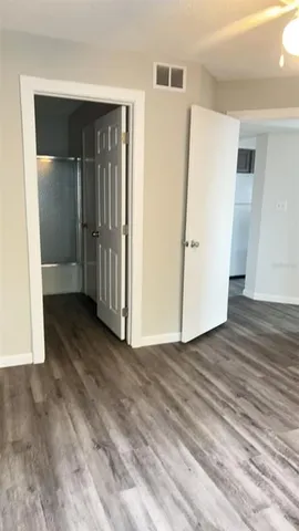 a bathroom with a toilet a sink and shower