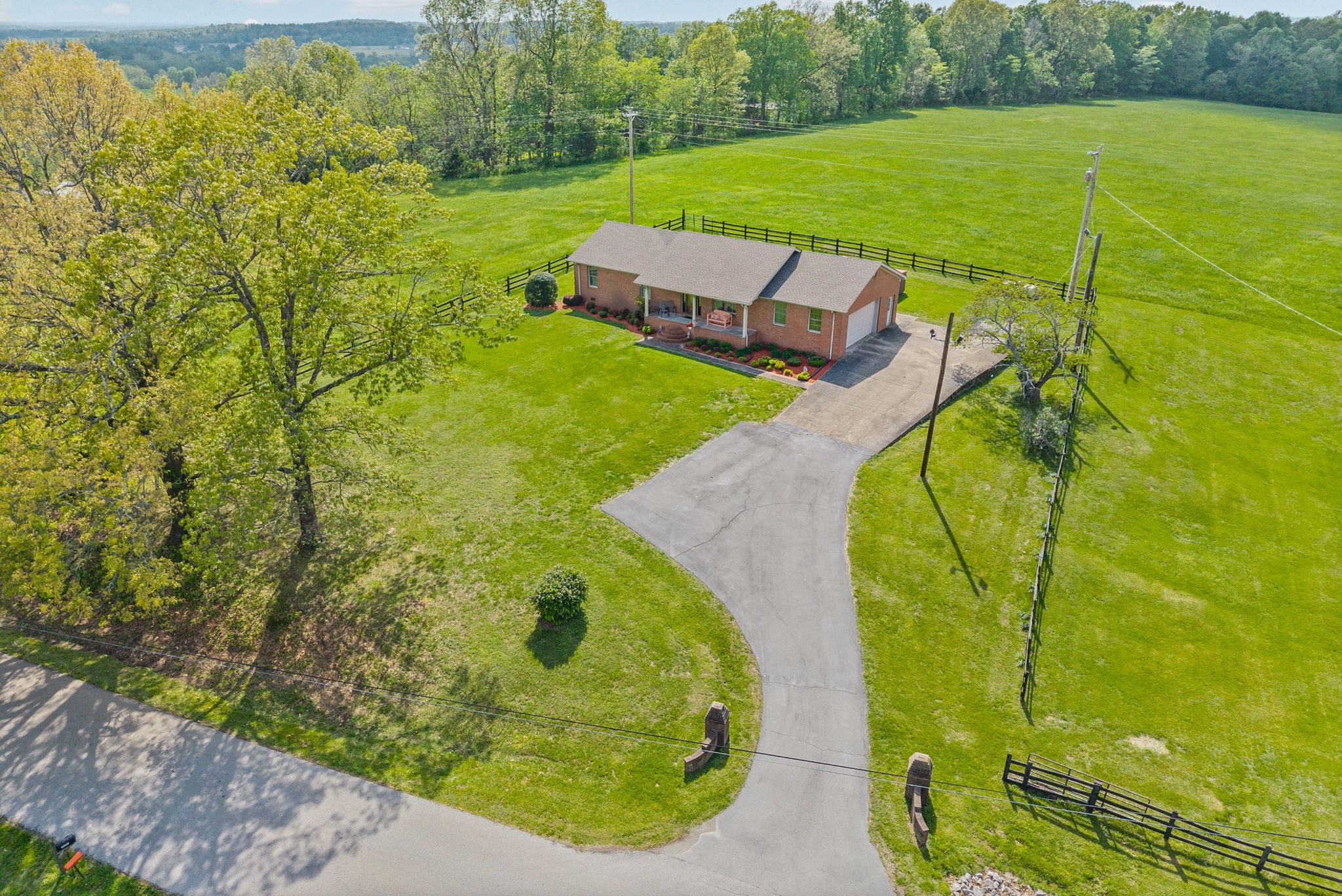 5005 Harmony Grove Road Hopkinsville, KY 42240 - Photo 1 of 41 a view of a swimming pool with a yard