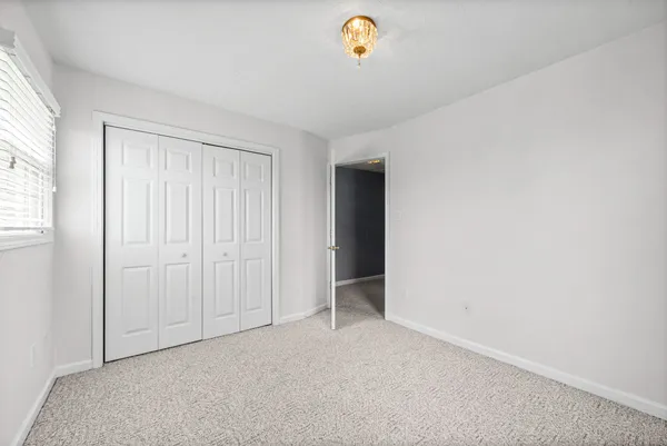 an empty room with window