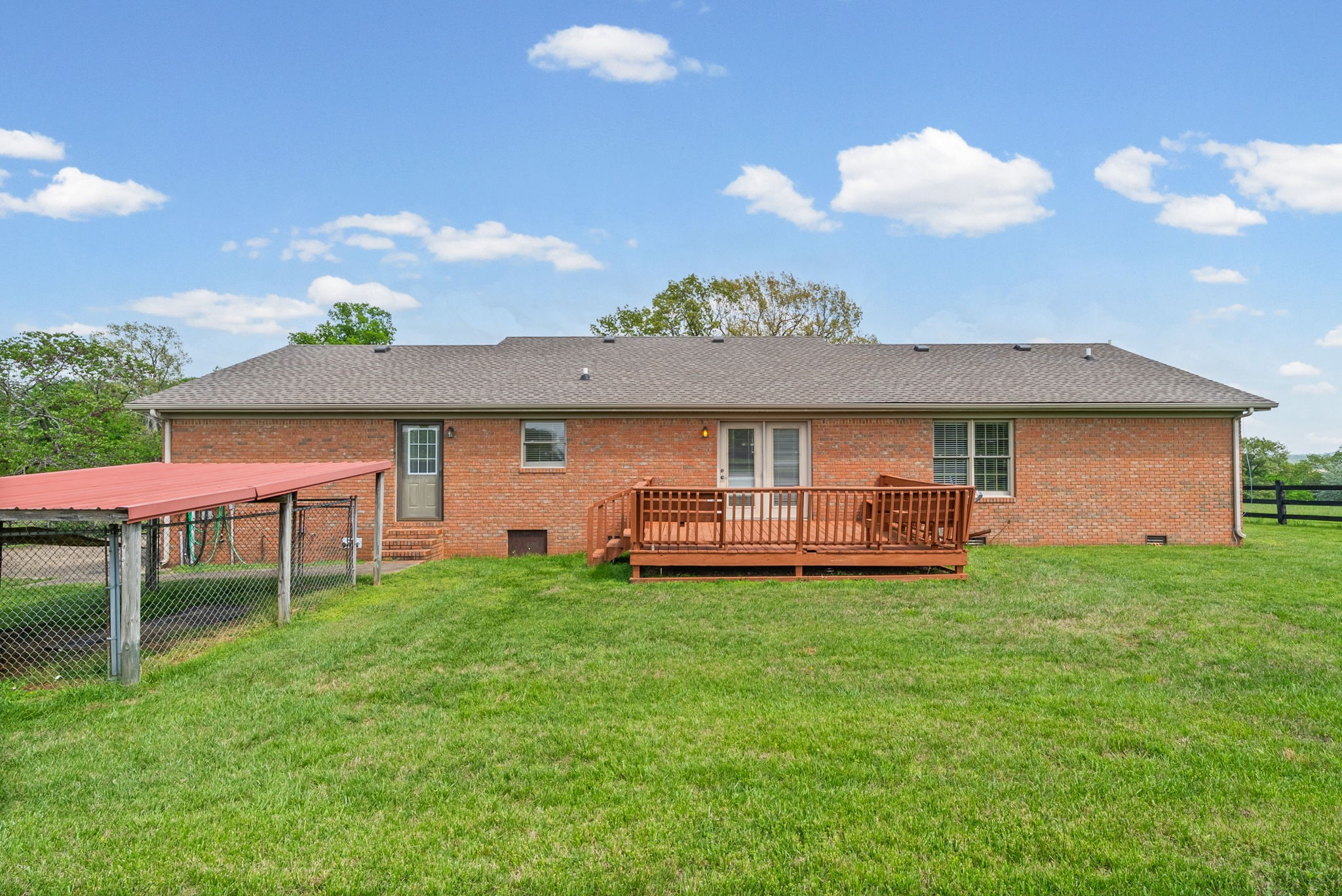 5005 Harmony Grove Road Hopkinsville, KY 42240 - Photo 34 of 41 a view of a house with a backyard