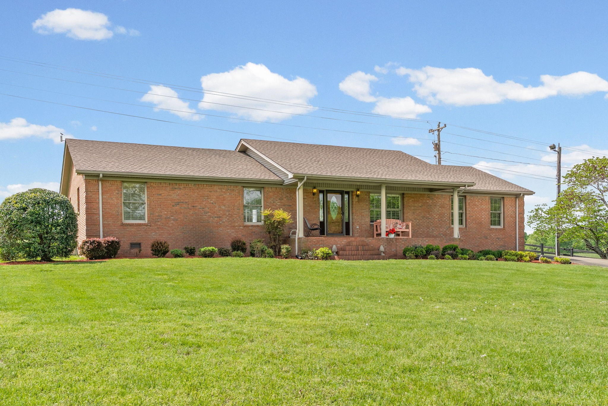 5005 Harmony Grove Road Hopkinsville, KY 42240 - Photo 5 of 41 a view of a house with a yard