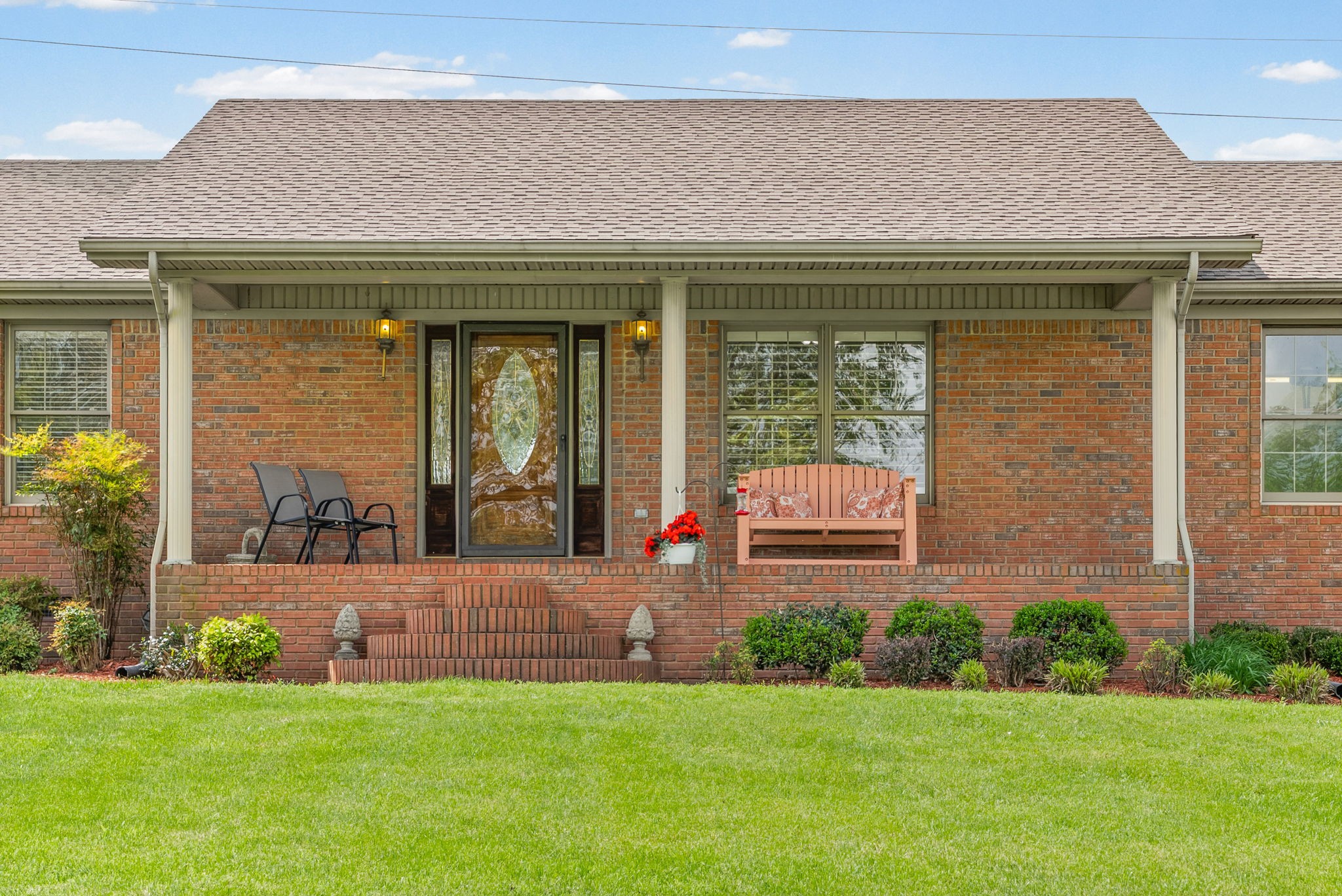5005 Harmony Grove Road Hopkinsville, KY 42240 - Photo 6 of 41 a view of a house with a garden and yard