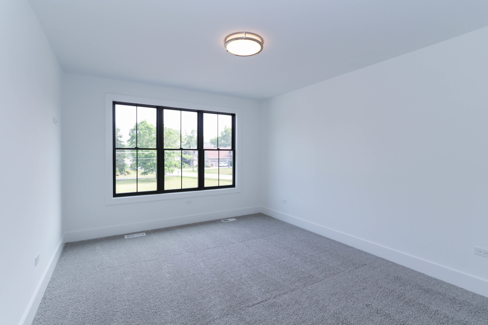 26205 Stewart Ridge Drive Plainfield, IL 60585 - Photo 22 of 28 an empty room with a window