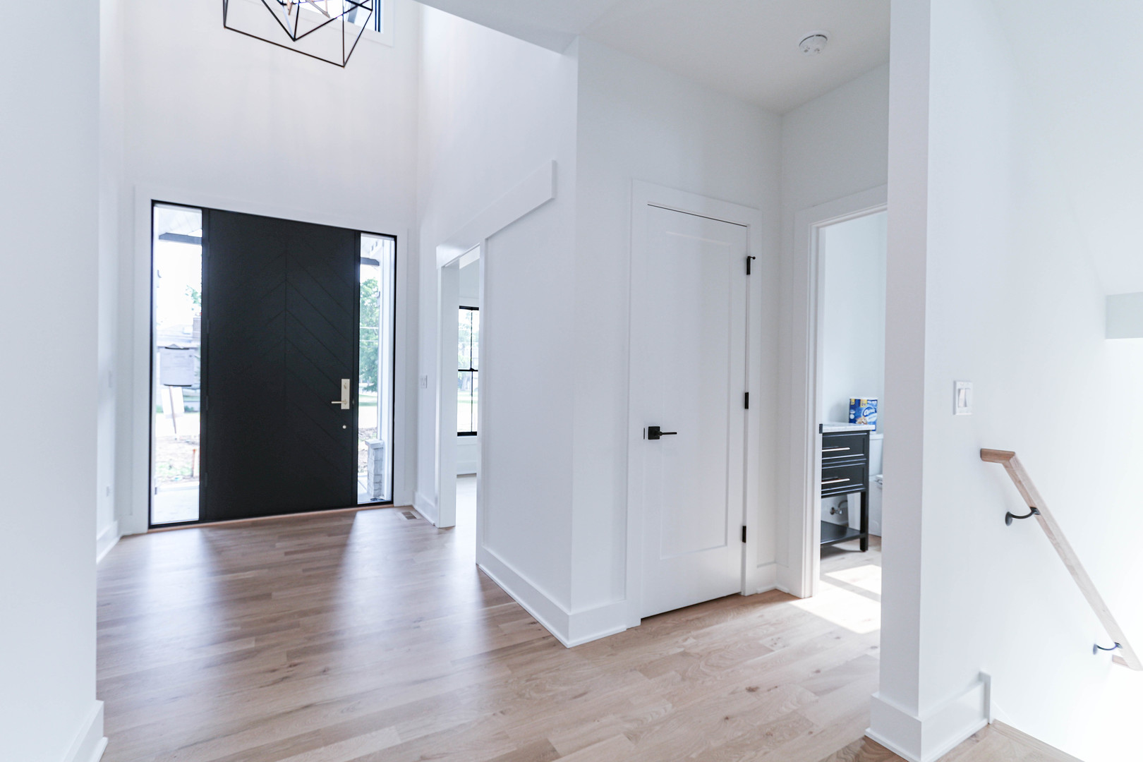 26205 Stewart Ridge Drive Plainfield, IL 60585 - Photo 4 of 28 a view of a hallway with wooden floor