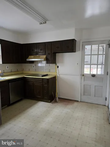 a kitchen with stainless steel appliances a cabinets and a sink