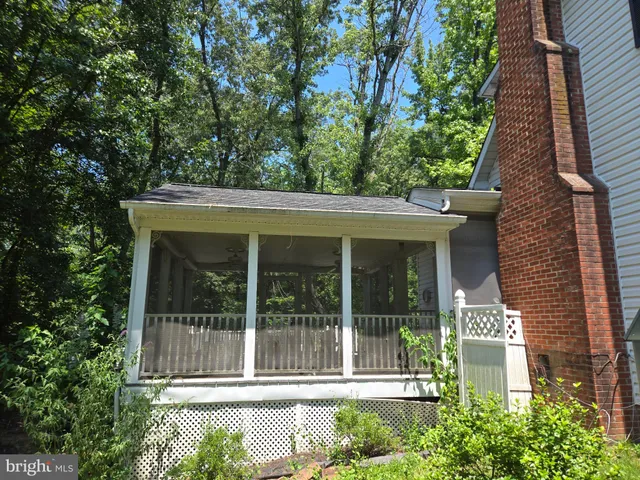 a view of a house with a small garden