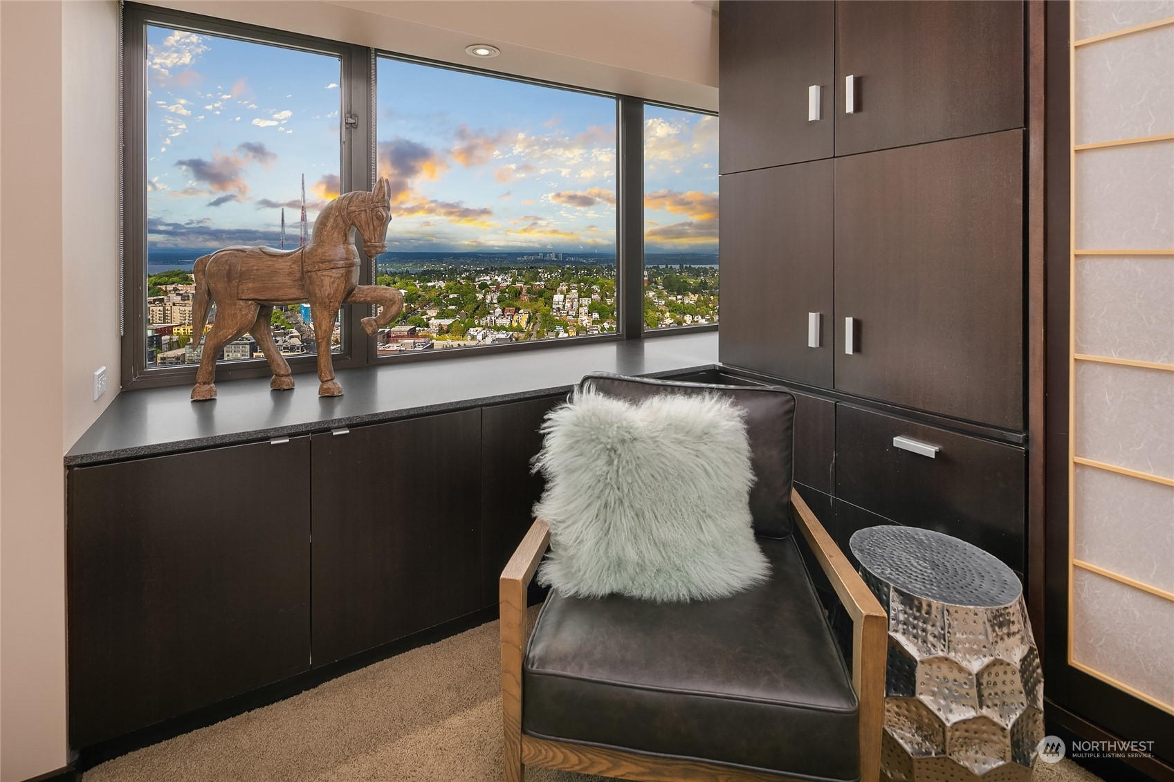 1301 Spring Street, Unit 29H Seattle, WA 98104 - Photo 13 of 29 a room with a large window