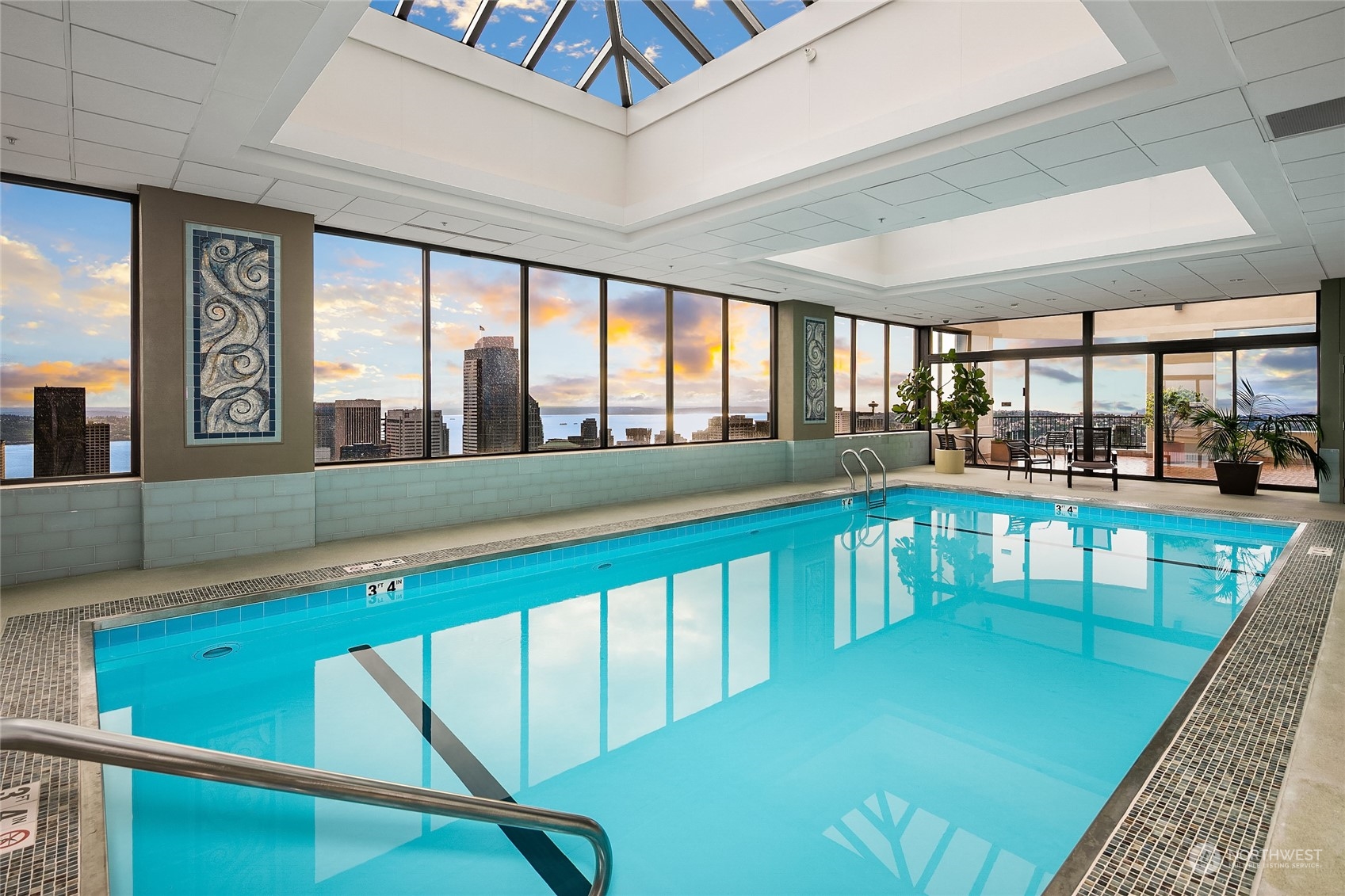 1301 Spring Street, Unit 29H Seattle, WA 98104 - Photo 26 of 29 a view of a living room and balcony