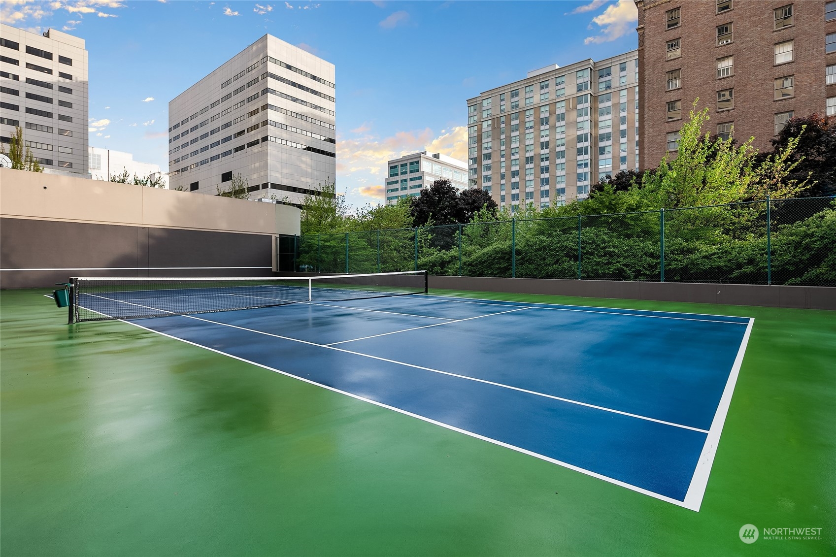 1301 Spring Street, Unit 29H Seattle, WA 98104 - Photo 29 of 29 a view of an outdoor space and tennis court