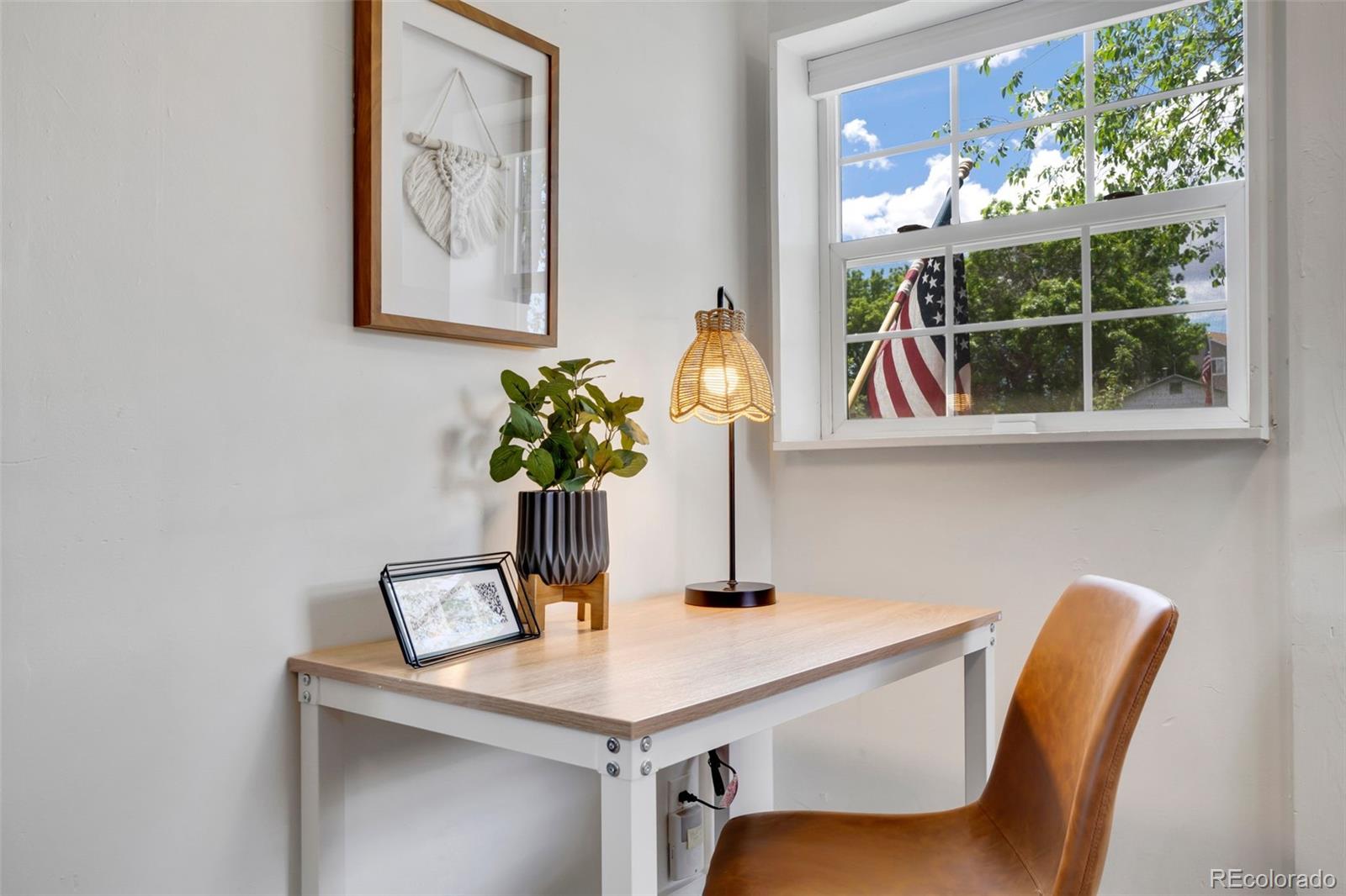 26 Main Street Windsor, CO 80550 - Photo 4 of 14 a dining room with furniture and window